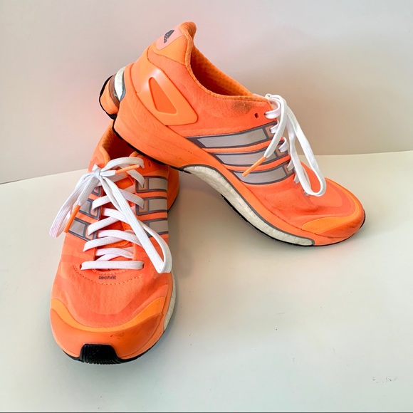 bright orange adidas shoes